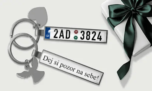 Personalized license plate keychain with heart and wing charms