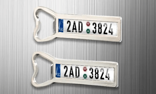 two magnet bottle openers on the fridge