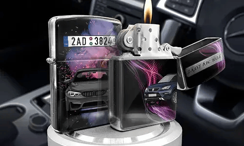 Set of metallic lighters with luxury car designs: one open with flame, others with purple light streaks, placed inside car interior