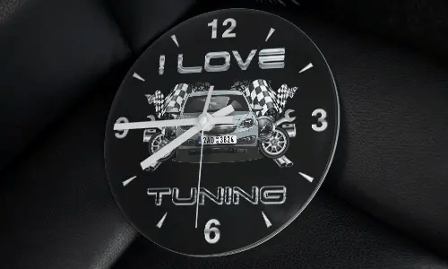 Wall clock with modified car, racing flags, wheels, and I LOVE TUNING text on black background