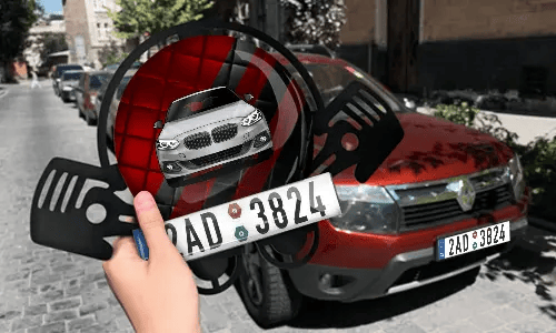 Autoschlüsselanhänger in der Hand mit dem Kennzeichen auto schlüsselanhänger gravur